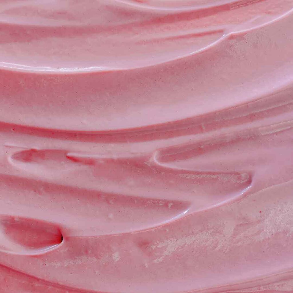 Homemade honey raspberry whipped cream in a bowl Fluffy whipped cream infused with raspberries and honey Delicious raspberry honey whipped cream topping for desserts Freshly made whipped cream with natural honey and raspberries Sweet and tangy honey raspberry whipped cream ready to serve