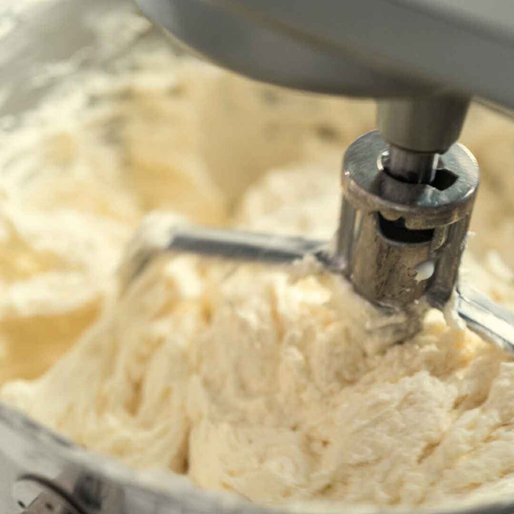 Mango lime buttercream frosting sweetened with honey Homemade mango lime frosting featuring natural honey Delicious honey-infused mango lime buttercream Sweet and tangy honey mango lime frosting Freshly made honey-sweetened mango lime buttercream