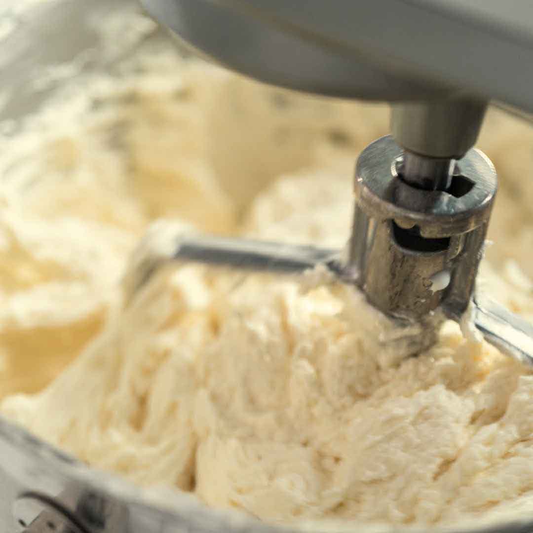 Mango lime buttercream frosting sweetened with honey Homemade mango lime frosting featuring natural honey Delicious honey-infused mango lime buttercream Sweet and tangy honey mango lime frosting Freshly made honey-sweetened mango lime buttercream