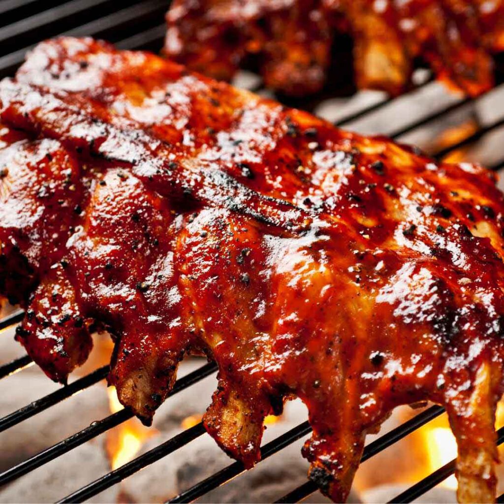 Margarita ribs with honey glaze on a plate Tequila lime marinated ribs with honey glaze Honey glazed baby back ribs with citrus marinade Grilled ribs basted with honey lime sauce Sweet and tangy honey glazed pork ribs