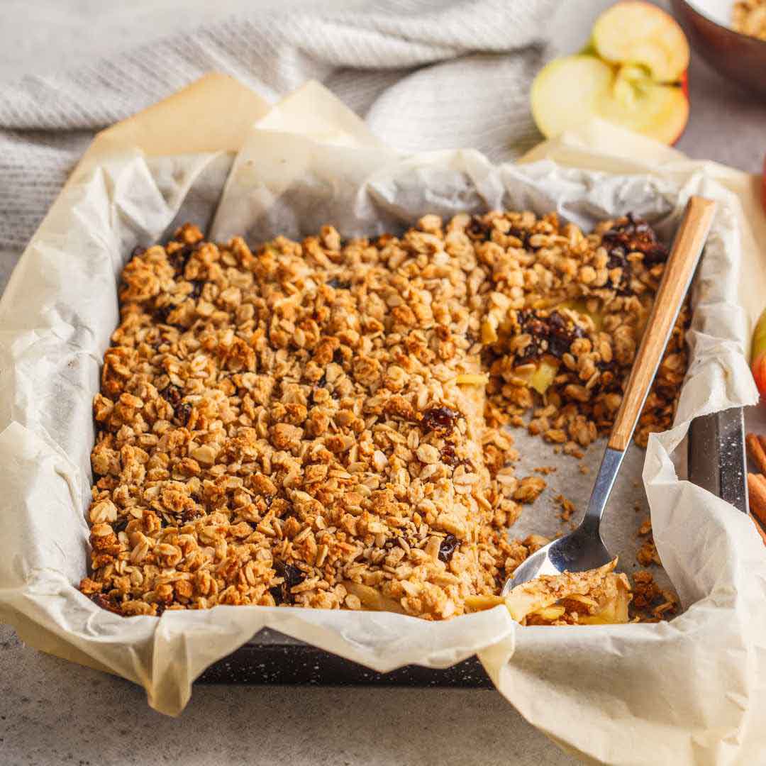 Slice of honey oatmeal cake with coconut and walnuts on a plate" "Homemade honey cake with oats and nuts, freshly baked" "Old-fashioned honey oatmeal cake with a golden crust" "Sweet and nutty honey cake, ready to be served" "Traditional honey cake with a crispy golden crust"